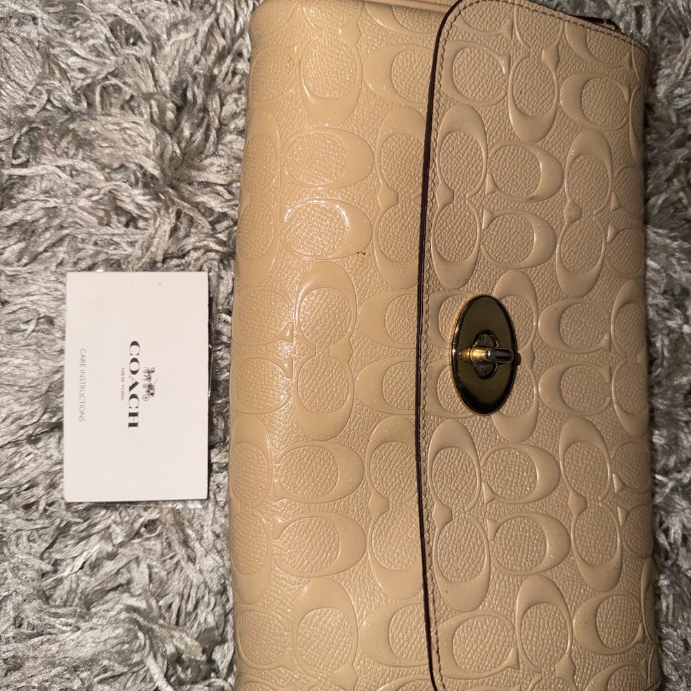 Coach women’s Tan Leather Logo Patch Bag crossbody